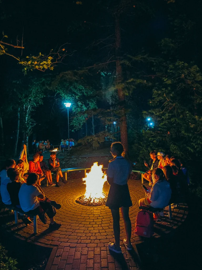 Chairs arranged in a circle around a fire pit