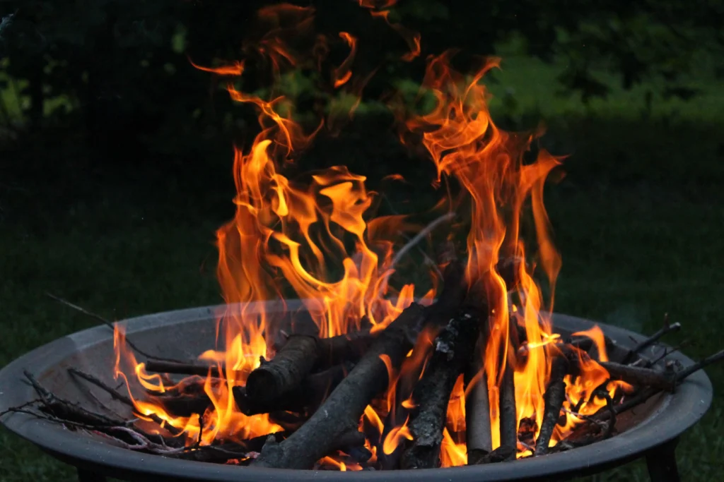 DIY wood-burning fire pit built from fire-rated brick