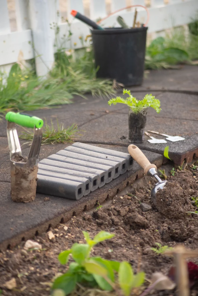 Installing garden edging with a half-moon tool