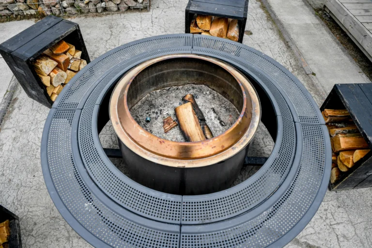 Backyard fire pit with stone seating area